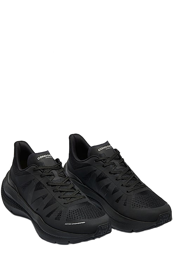 Top view pair of Veja running shoes in black with silver accents, shown against a plain white background.