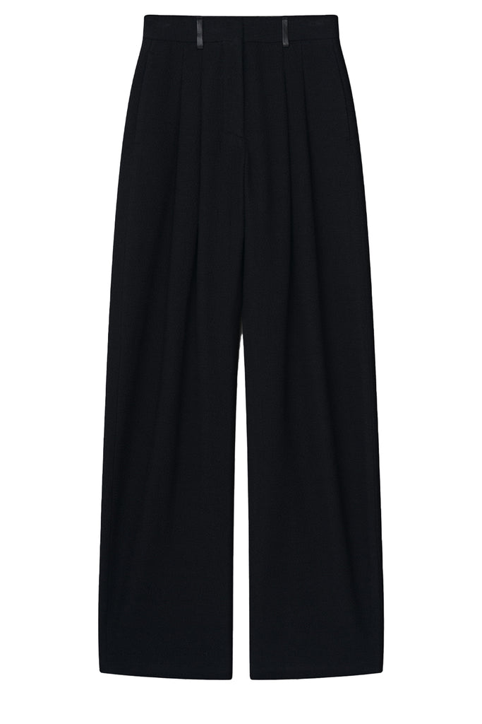 Nanushka trousers in black, shown against a plain white background.
