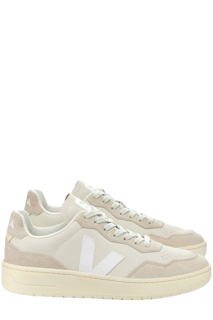 The V-90 organic-traced leather sneakers in pierre and white colors from the brand VEJA