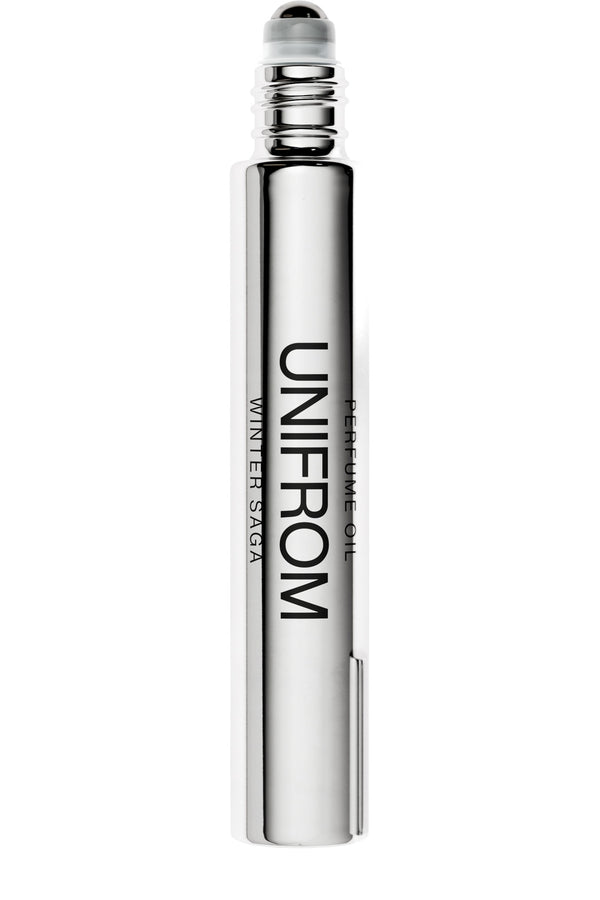 A silver metallic perfume oil roller bottle labeled 'UNIFROM' and 'WINTER SAGA' on a plain white background.