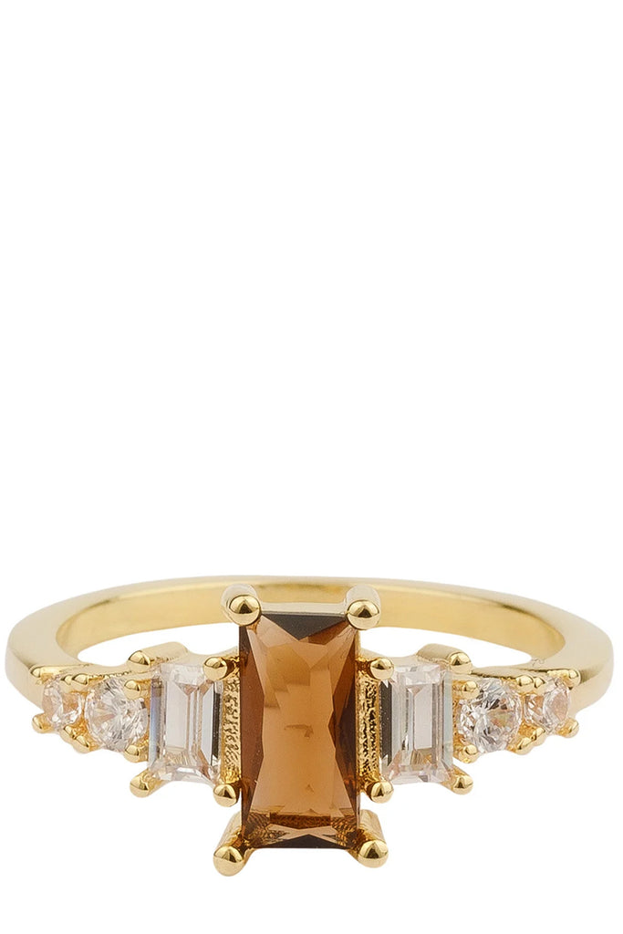 The big rectangle ring in gold and brown colour from the brand ALL THE LUCK IN THE WORLD