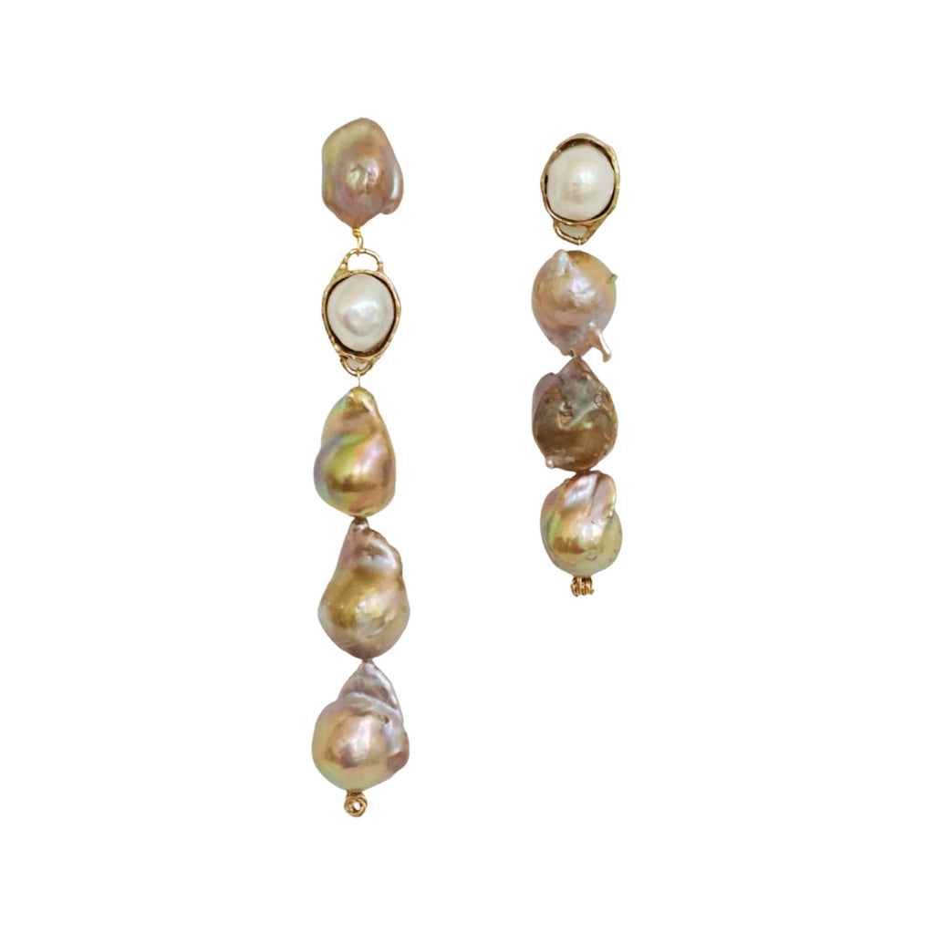 The She Is Radiant earrings in gold and pearl colours from the brand ANITA BERISHA