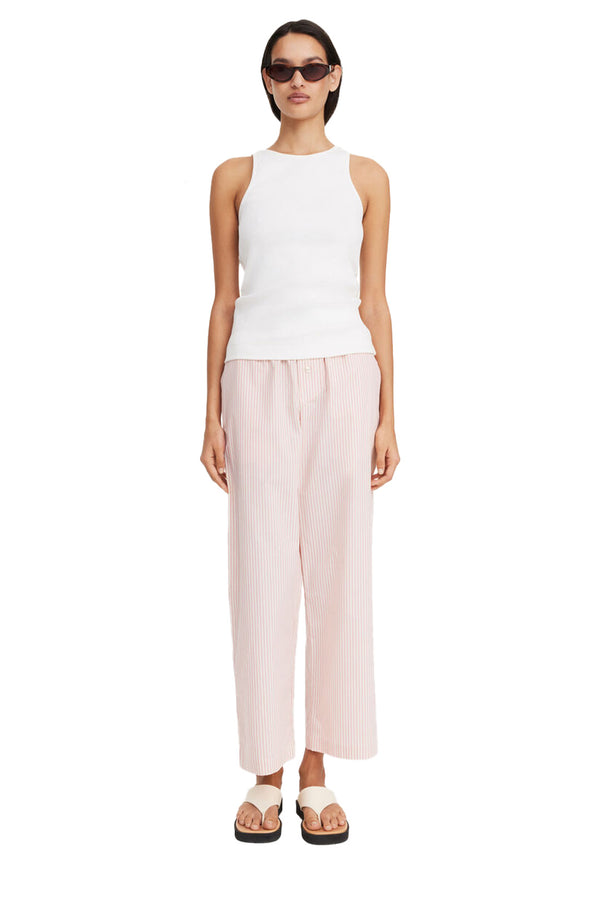 Model wearing the Helsy Straight-Leg Organic-Cotton Pants in pink colour from the brand BY MALENE BIRGER