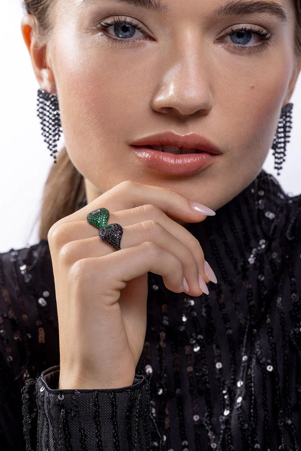 Model wearing the bhw fringe heart stud earrings in black colour from the brand CRYSTAL HAZE