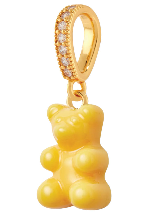 The nostalgia bear pendant with pave connector in taxi yellow and gold colors from the brand CRYSTAL HAZE