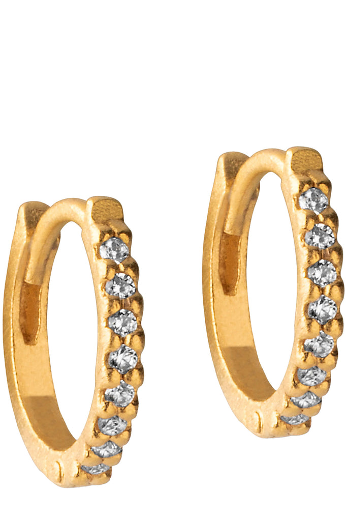The petite flora hoop earrings in gold colour from the brand ENAMEL COPENHAGEN