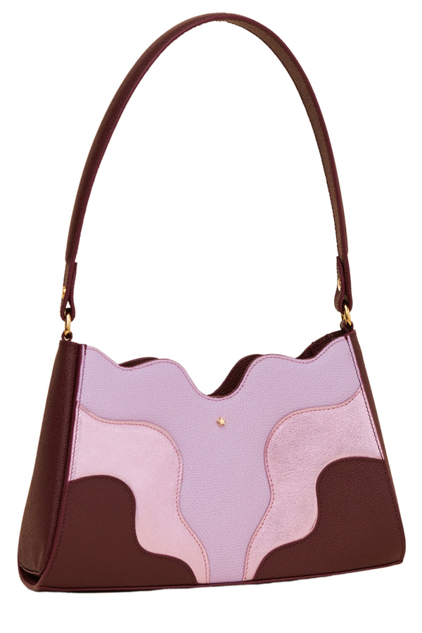 The mini wave bag in burgundy color from the brand NINI