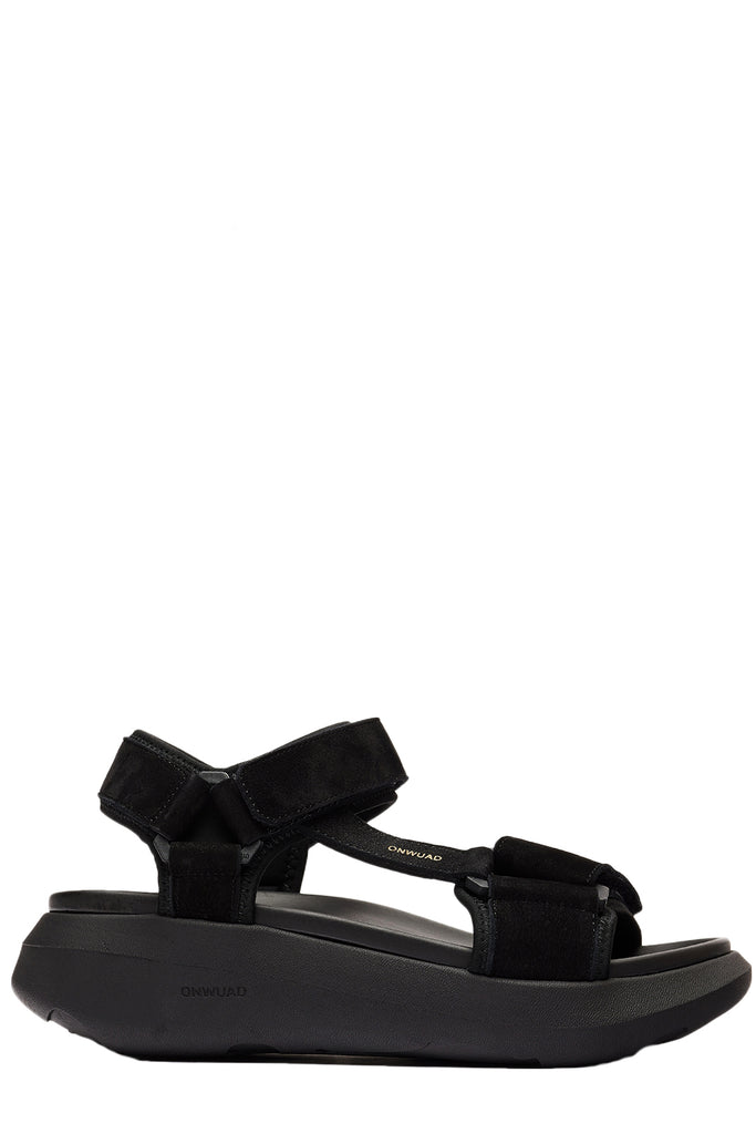 The Schon Tech Nubuck Leather Sandals in black colour from the brand Onwuad
