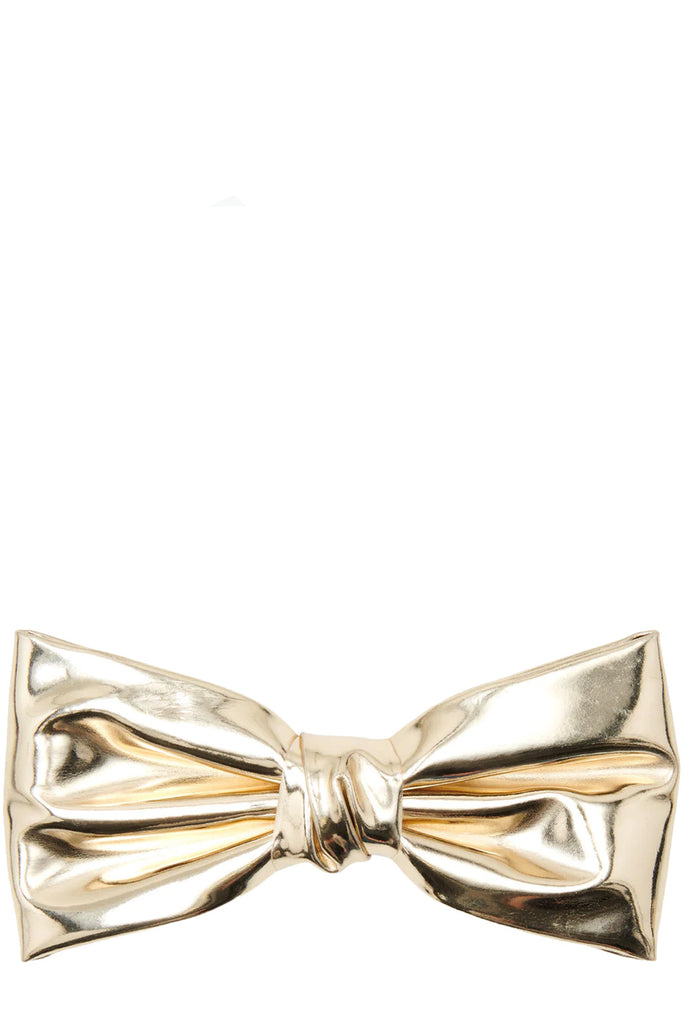 The Kiki bow clip in gold colour from the brand PICO COPENHAGEN