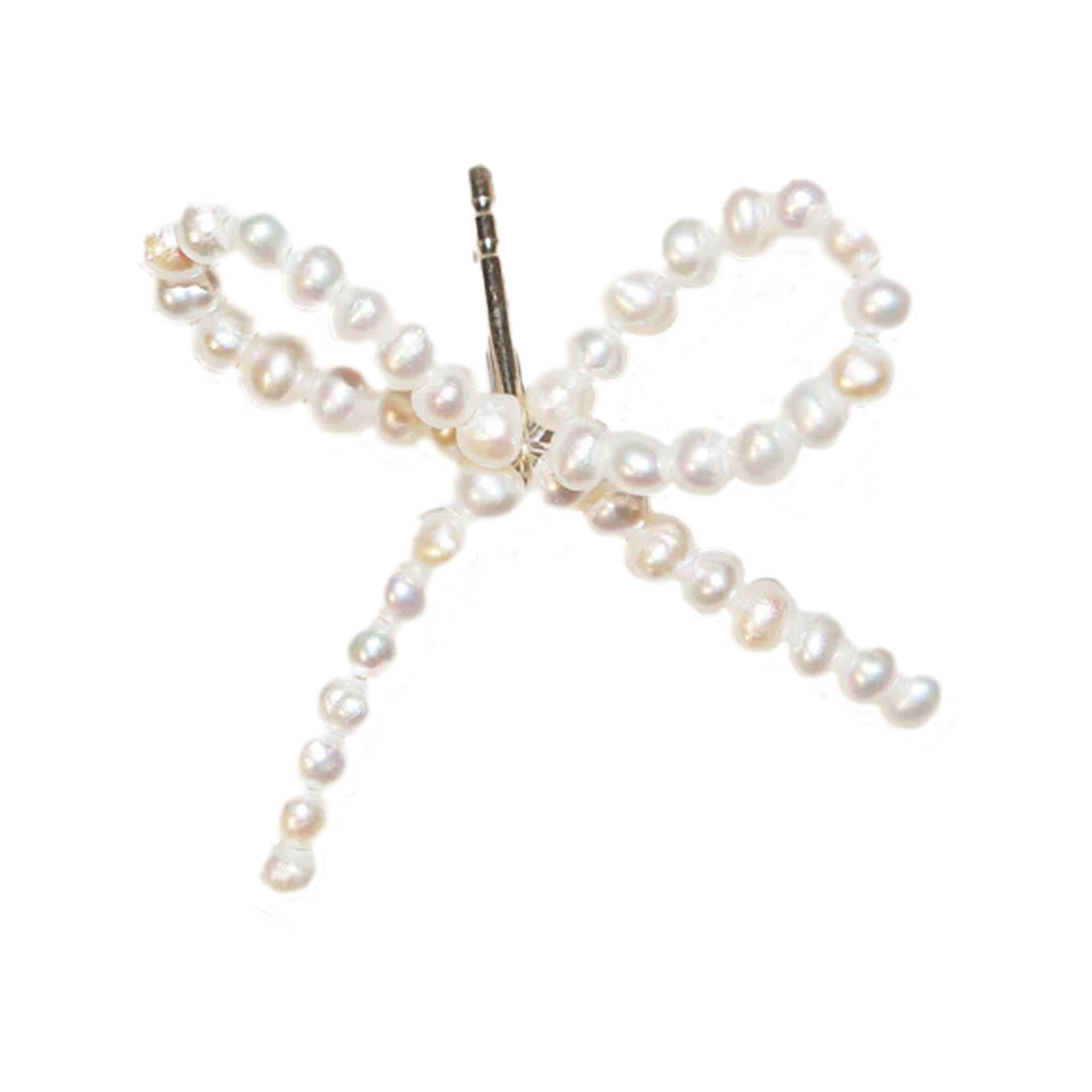 The pearl bow single earstud in gold and pearl colour from the brand SASKIA DIEZ
