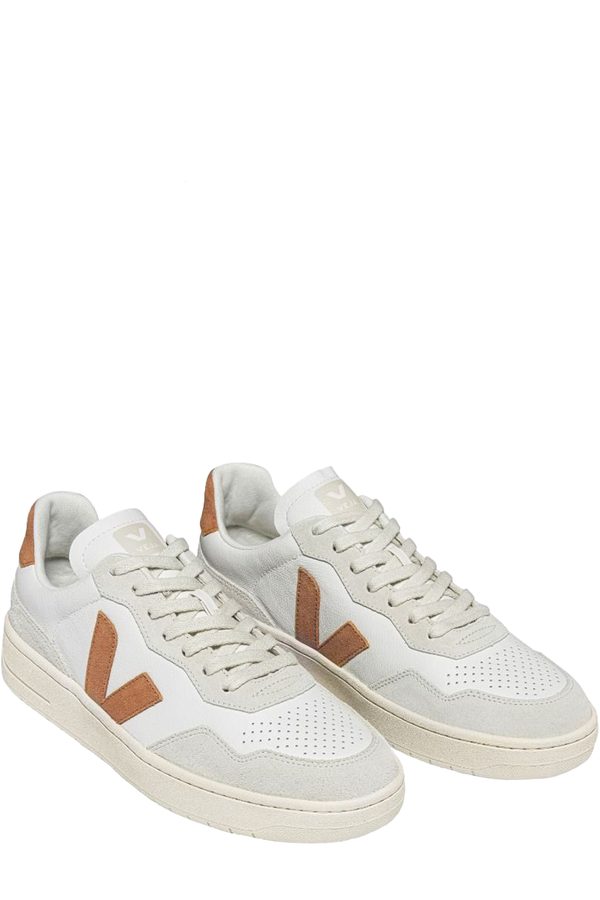 The V-90 organic-traced leather sneakers in white and umber colours from the brand VEJA