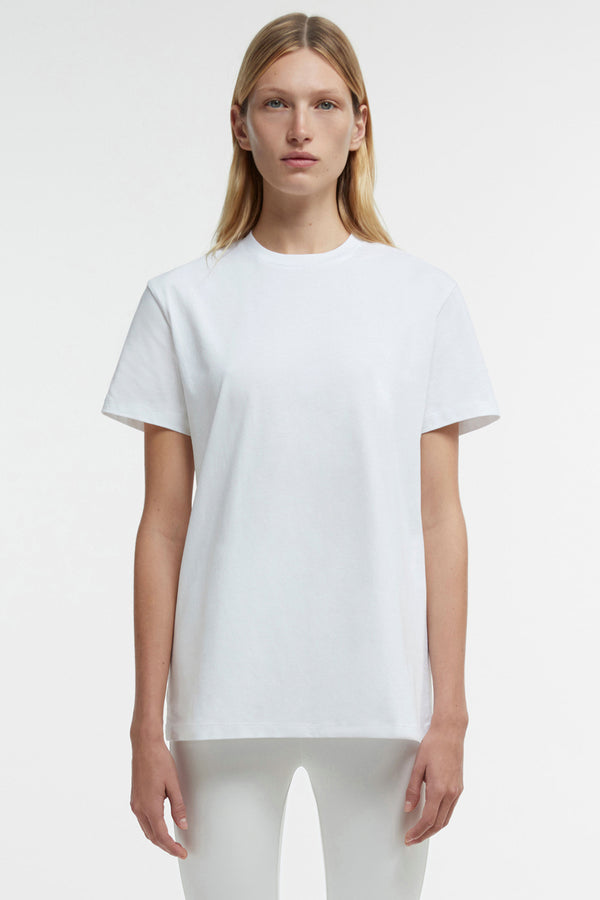 Model wearing the Classic Boxy-Fit T-Shir in white colour from the brand Wardrobe.NYC