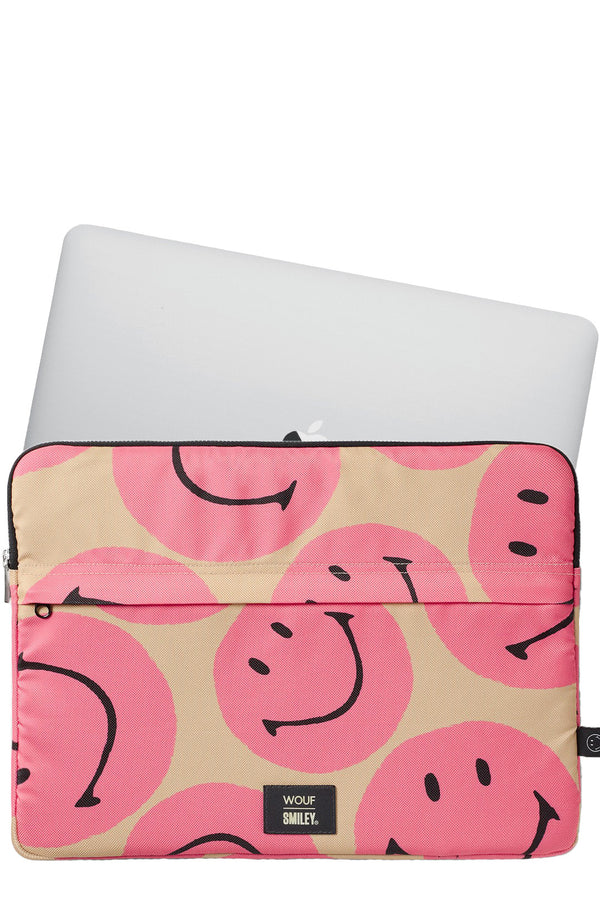 The Smiley Pink laptop case in pink color from the brand WOUF