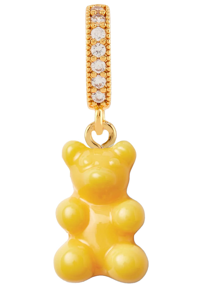 The nostalgia bear pendant with pave connector in taxi yellow and gold colors from the brand CRYSTAL HAZE