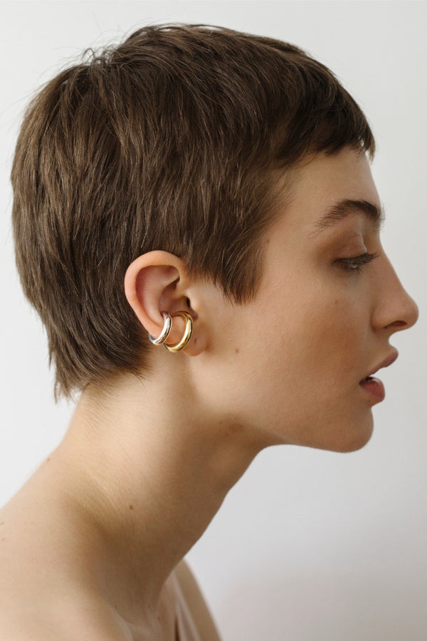 Model wearing the bold earcuff No2 in silver color from the brand Saskia Diez